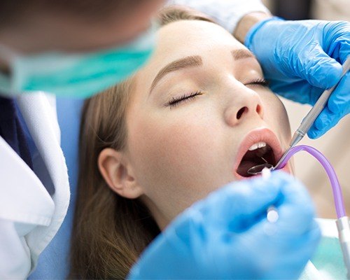 Relaxed patient receiving dental care