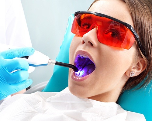 Patient receiving dental sealants