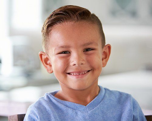 Young boy with healthy smile