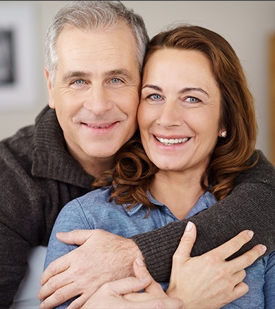 Smiling older man and woman