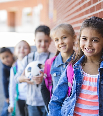 Group of smiling kids outdoors