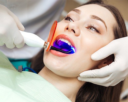 Woman receiving dental bonding