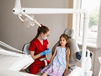 Nervous little girl at dentist’s office