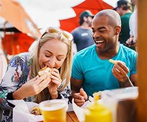 People eating food in public