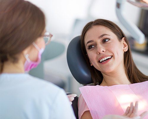 Smiling woman in dental chair