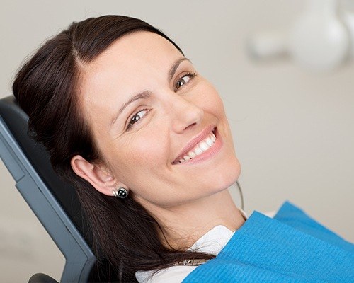 Woman in dental chair smiling