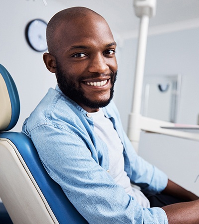 Male dental patient smiling after root canal therapy in Center, TX