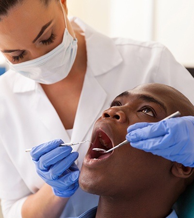 Man receiving dental treatment