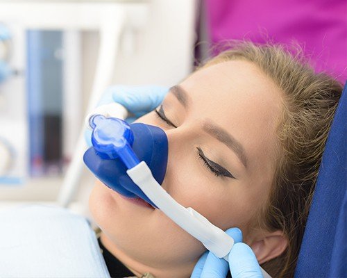 Patient with nitrous oxide nose mask