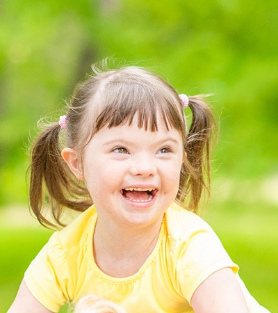 Child after special needs dentistry in Center