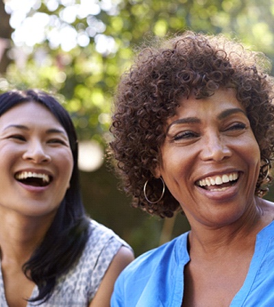 people laughing and smiling together