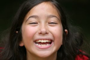 child growing smile