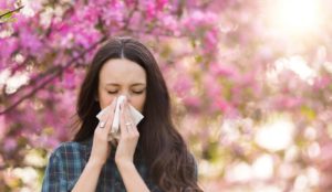 woman suffering from spring allergies