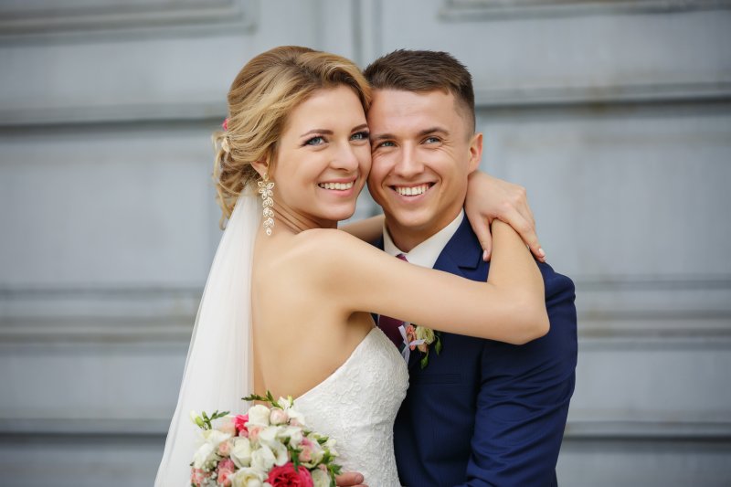 Smiling wedding couple