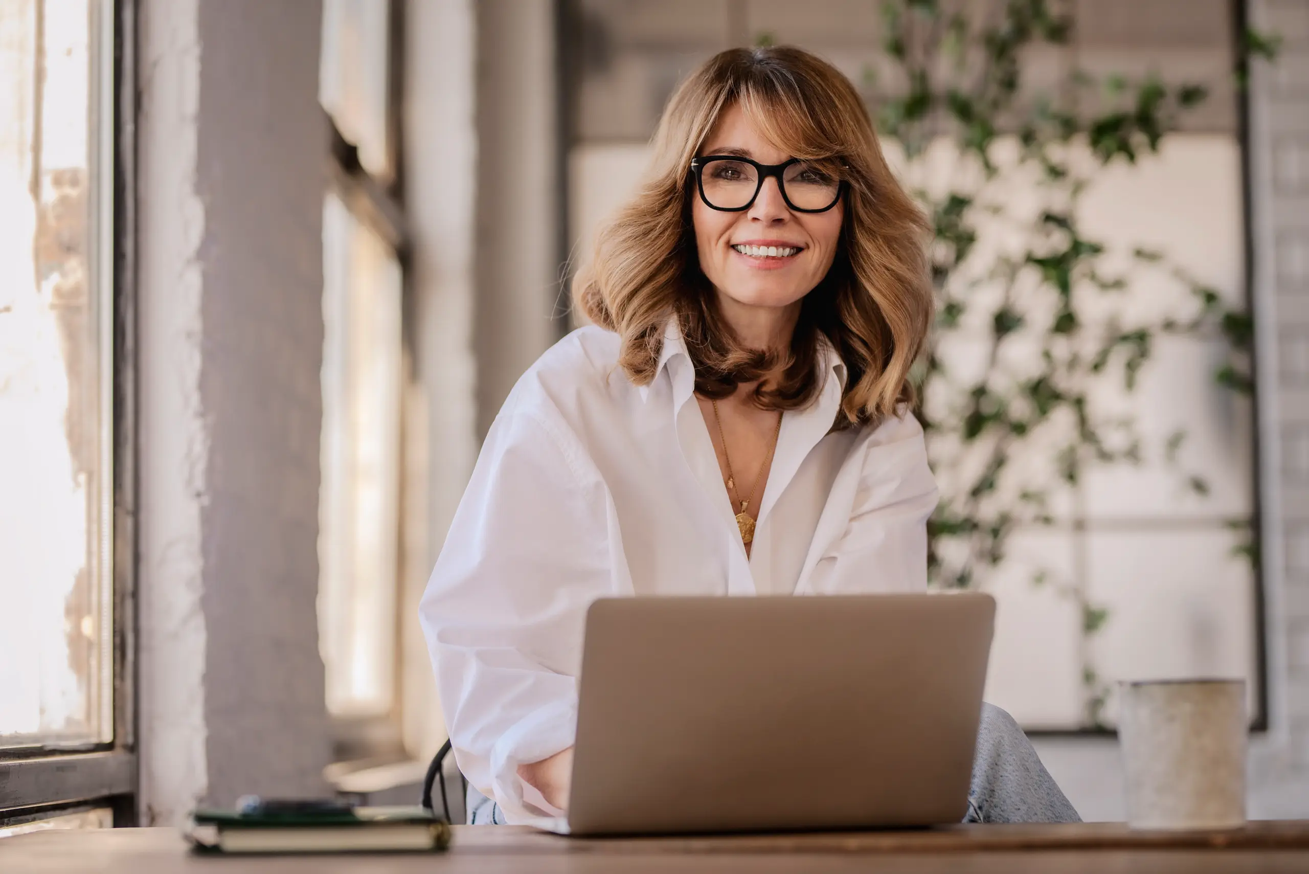 Woman scheduling dental appointment online for Cosmetic Dentistry in Center TX