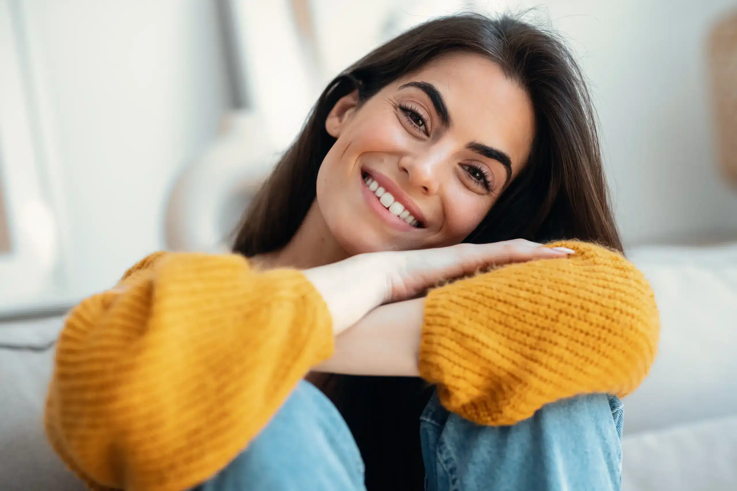 Woman smiling with bright healthy teeth after dental care in Center TX