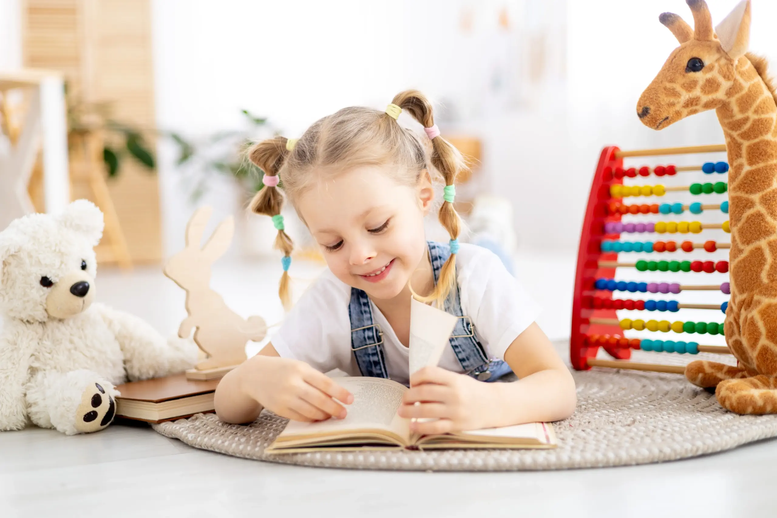 Young child smiling and learning representing healthy growth in Center TX